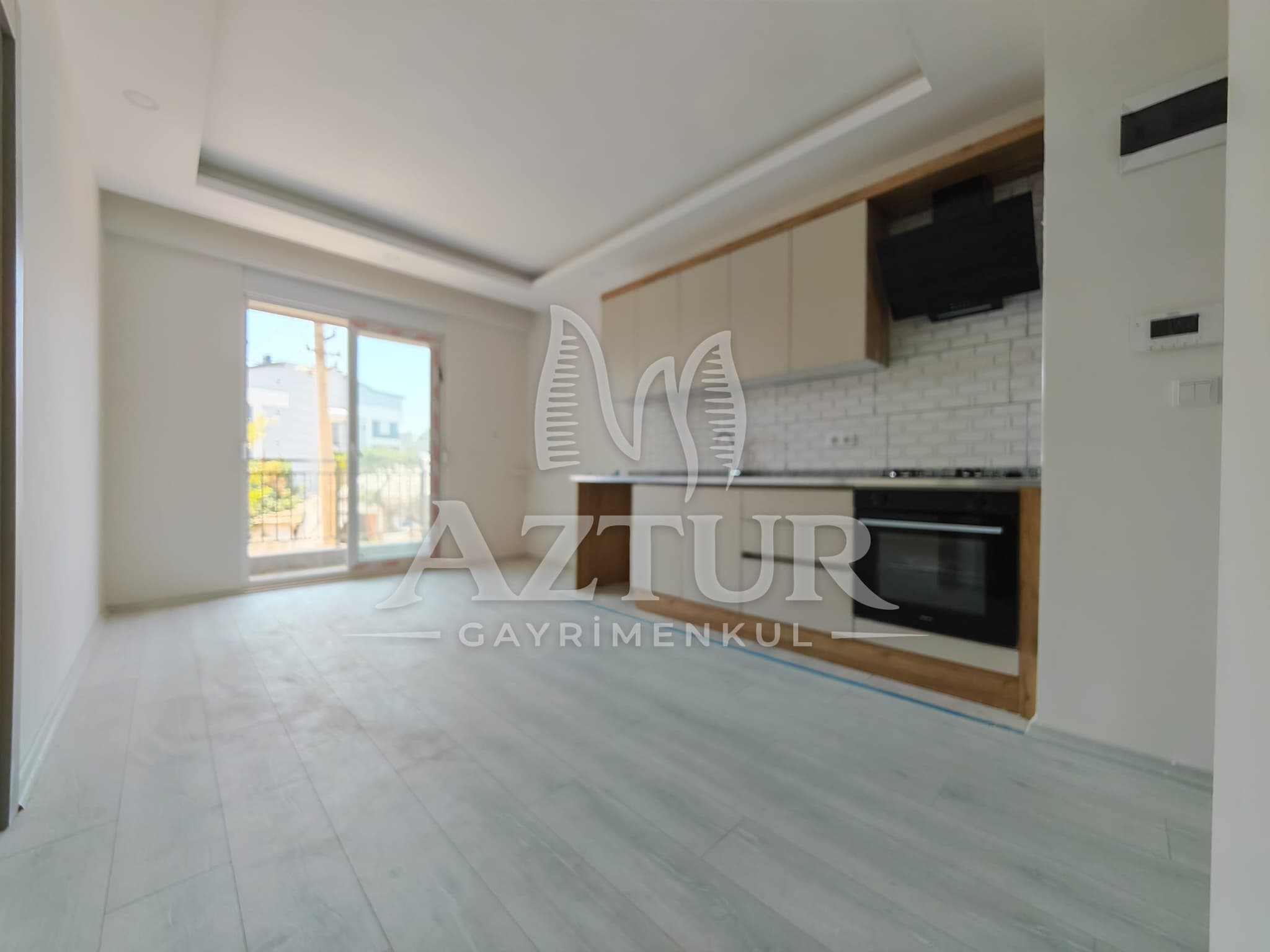 ÇAMLIBEL'DE ARAKAT AÇIK MUTFAK 1+1 SATILIK DAİRE
