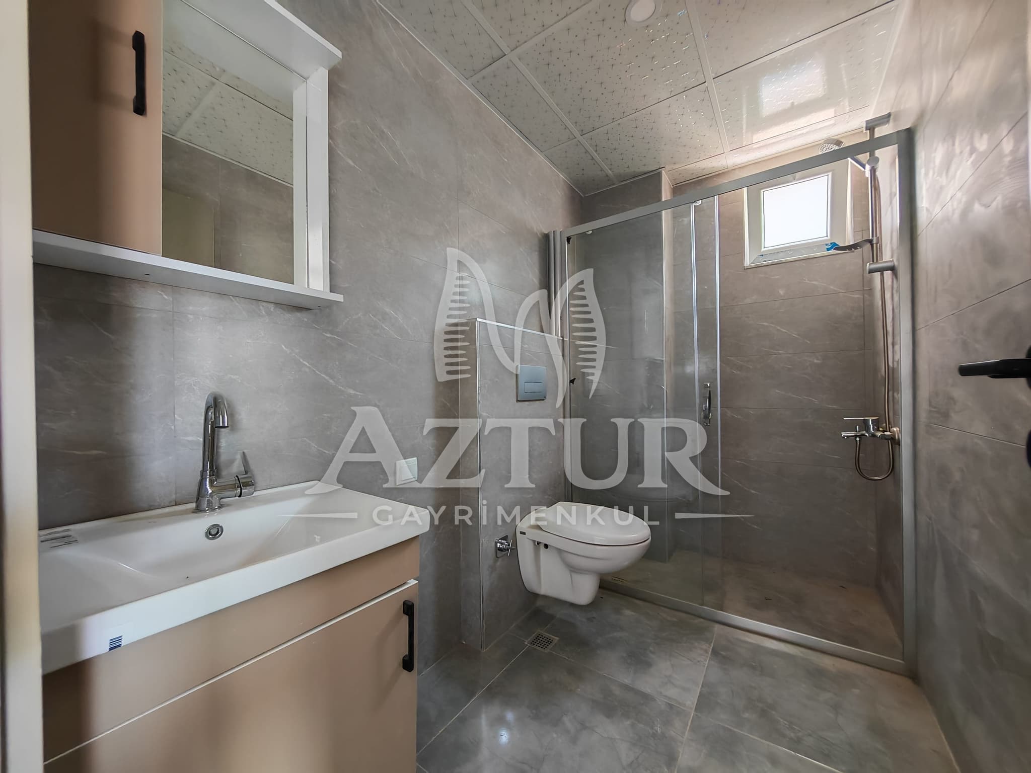 ÇAMLIBEL'DE ARAKAT AÇIK MUTFAK 1+1 SATILIK DAİRE
