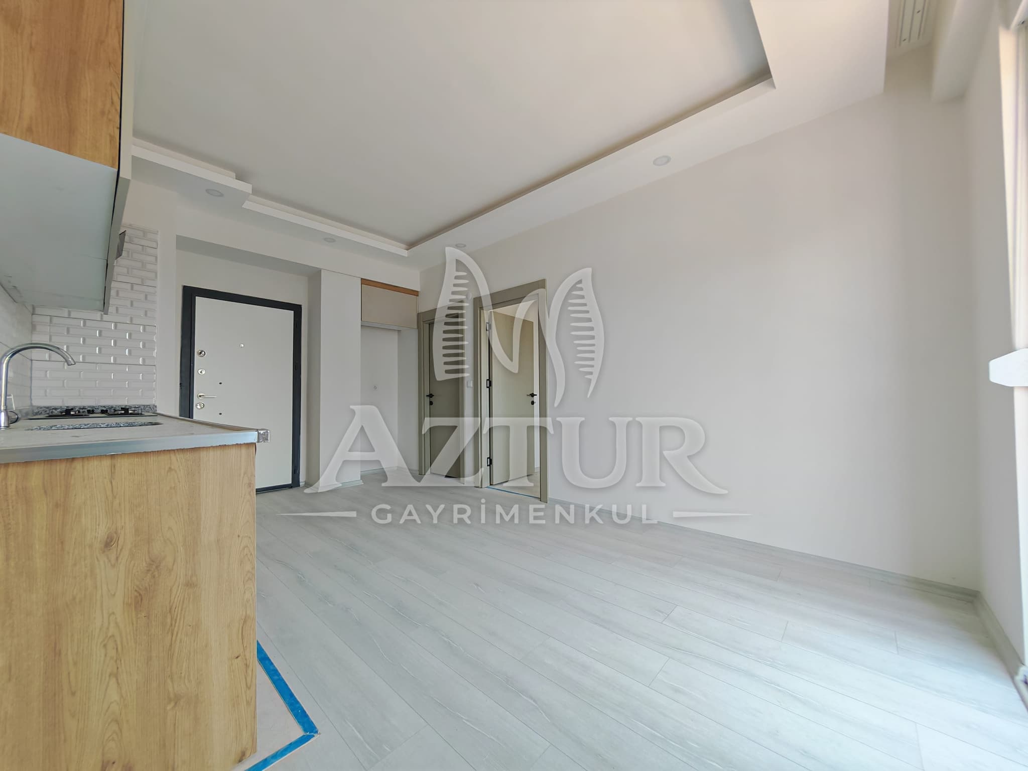 ÇAMLIBEL'DE ARAKAT AÇIK MUTFAK 1+1 SATILIK DAİRE