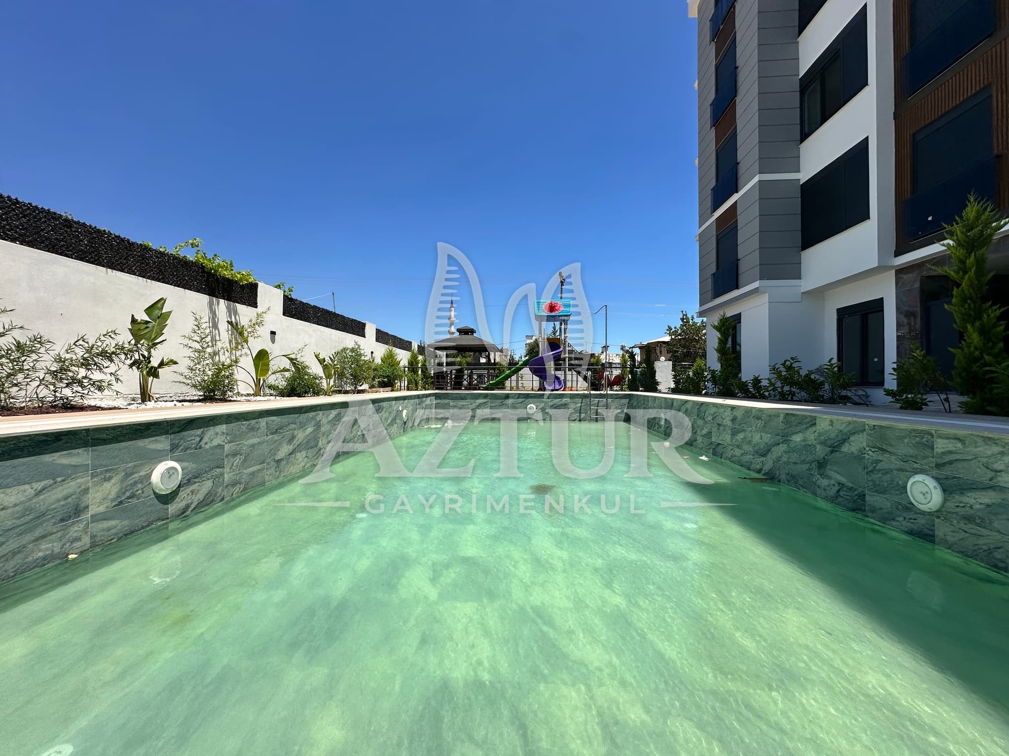 DEMİREL'DE HAVUZ-AÇIK OTOPARK SİTE İÇERİSİNDE 2+1 Y.GİRİŞ SATILIK DAİRE