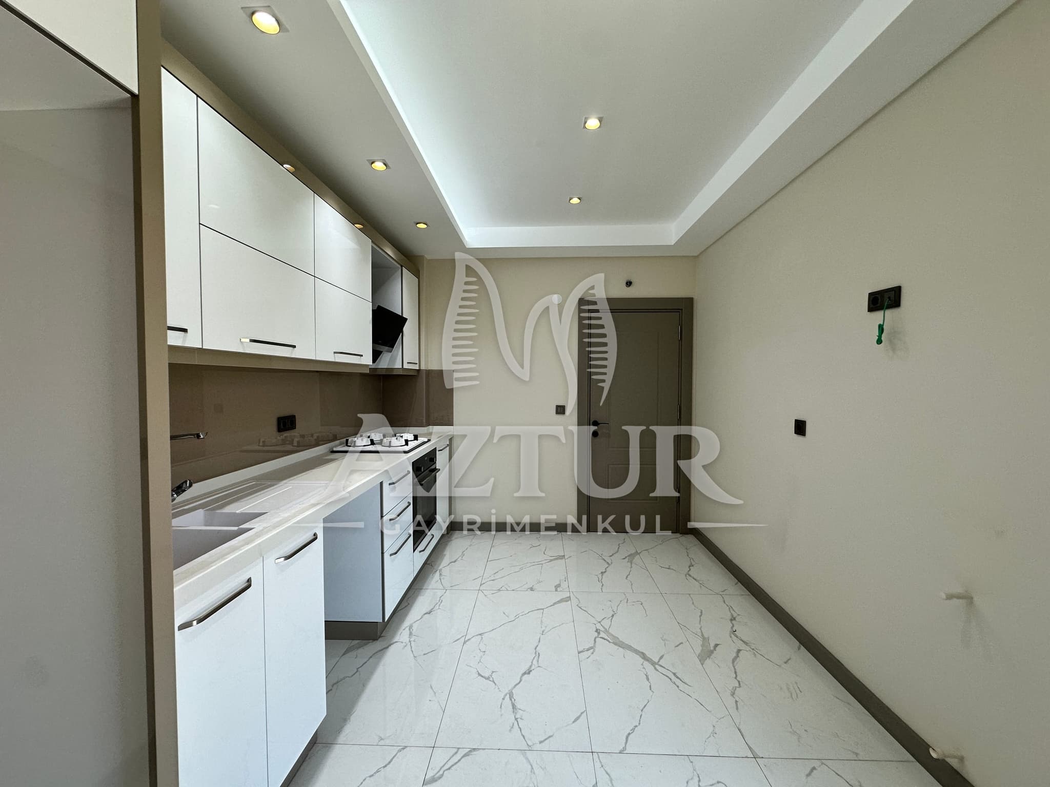 KIRÇİÇEĞİ CADDESİNDE AYRI MUTFAK SIFIR 2+1 SATILIK DAİRE