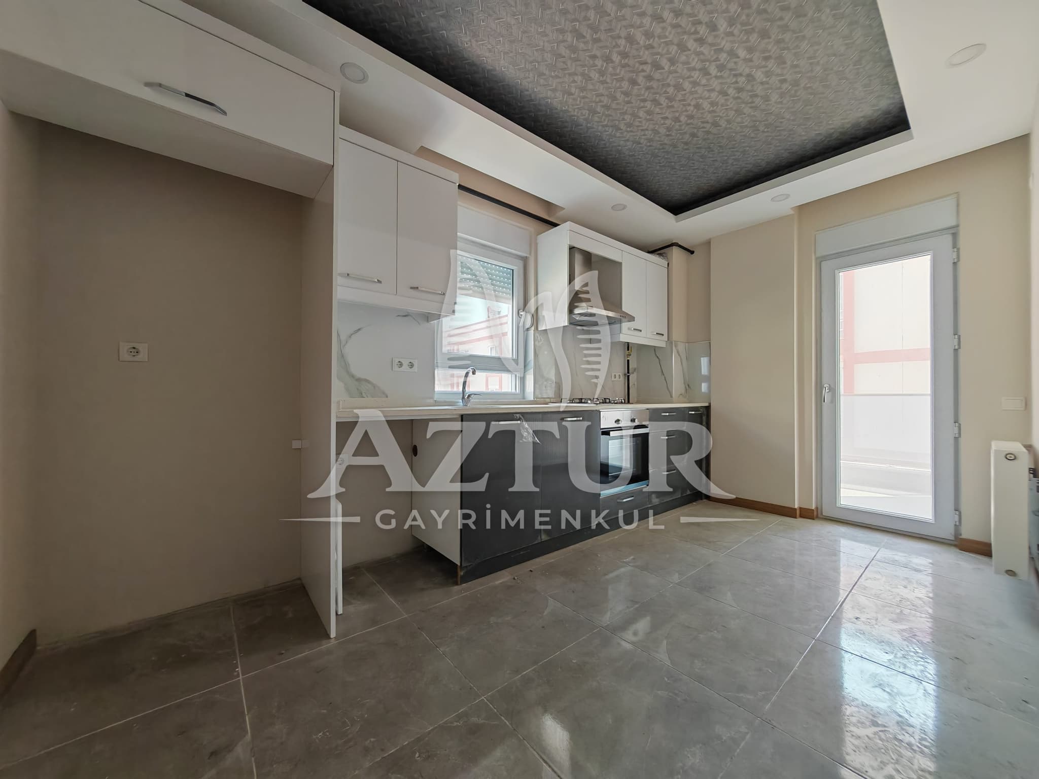 BÜYÜKŞEHİR BELEDİYESİNE YAKIN KONUMDA ARAKAT SIFIR 2+1 SATILIK DAİRE