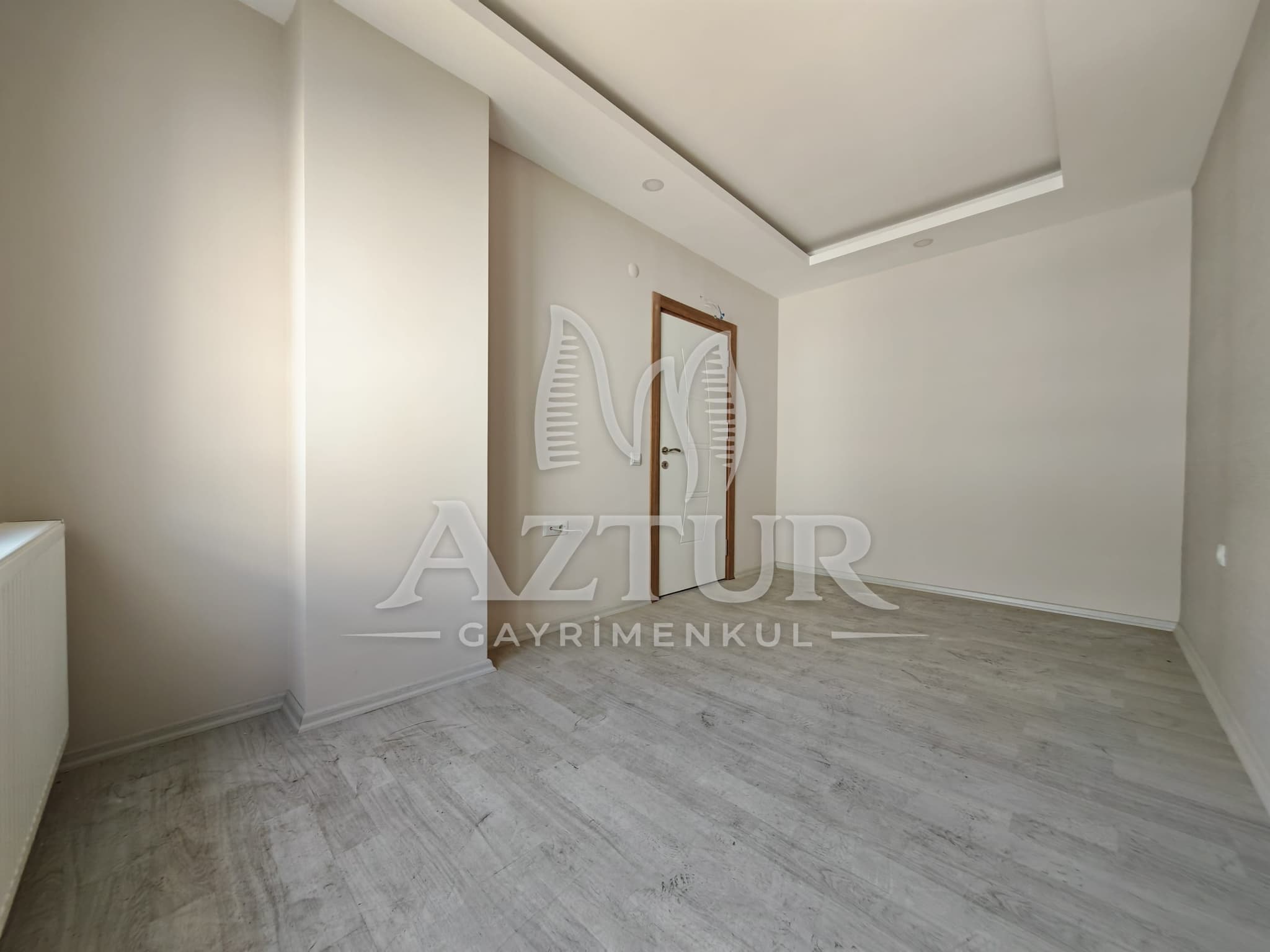 BÜYÜKŞEHİR BELEDİYESİNE YAKIN KONUMDA ARAKAT SIFIR 2+1 SATILIK DAİRE