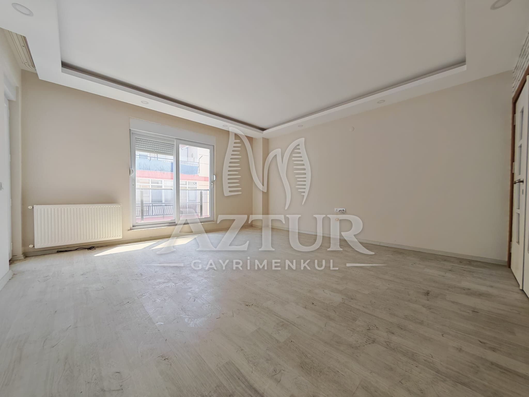 BÜYÜKŞEHİR BELEDİYESİNE YAKIN KONUMDA ARAKAT SIFIR 2+1 SATILIK DAİRE