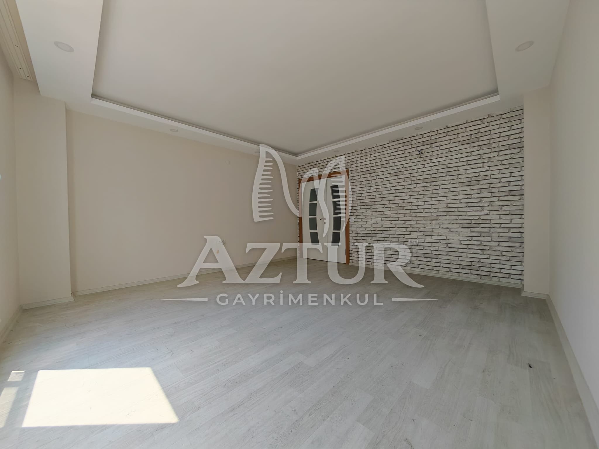 BÜYÜKŞEHİR BELEDİYESİNE YAKIN KONUMDA ARAKAT SIFIR 2+1 SATILIK DAİRE