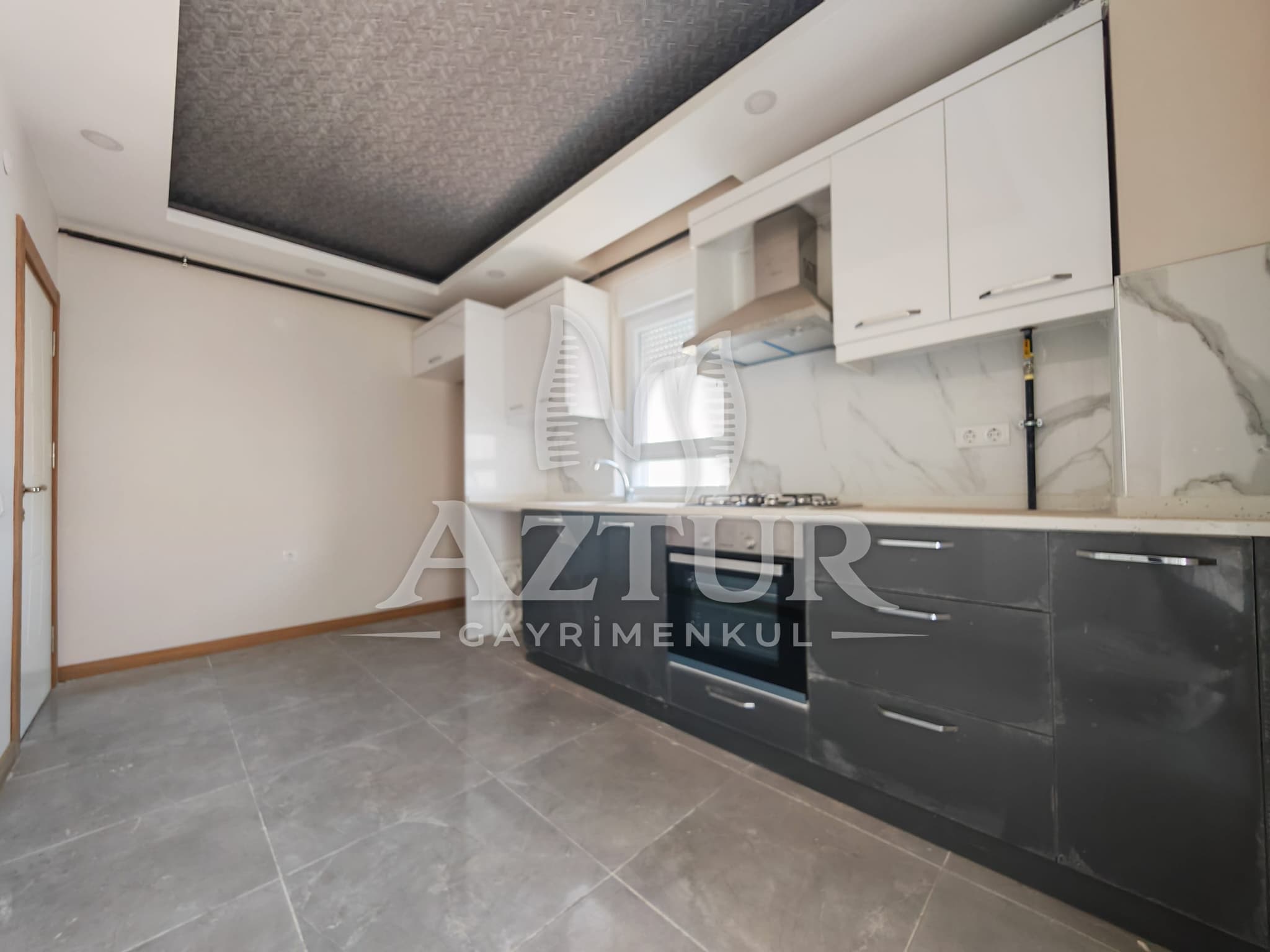 BÜYÜKŞEHİR BELEDİYESİNE YAKIN KONUMDA ARAKAT SIFIR 2+1 SATILIK DAİRE