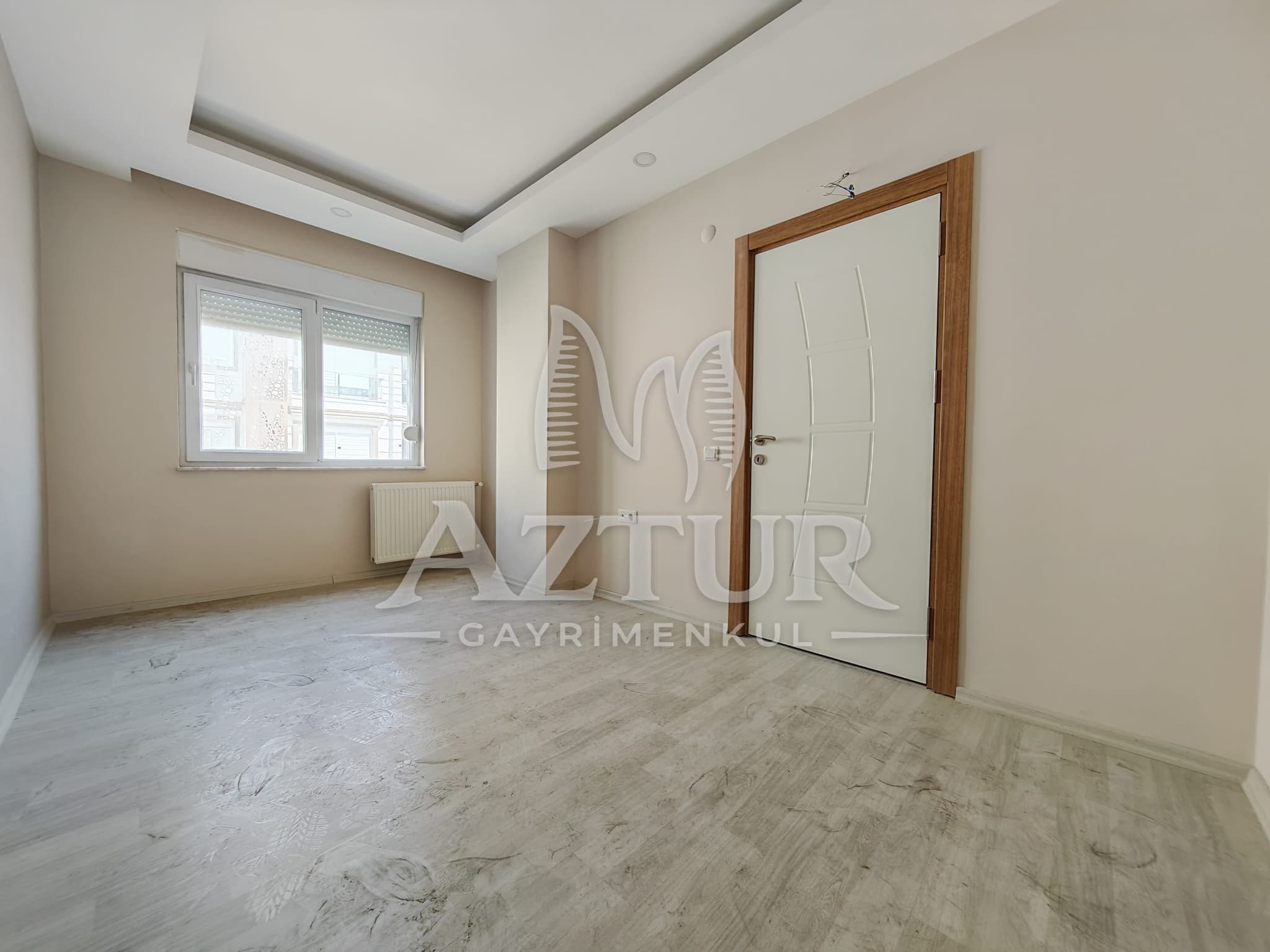BÜYÜKŞEHİR BELEDİYESİNE YAKIN KONUMDA ARAKAT SIFIR 2+1 SATILIK DAİRE
