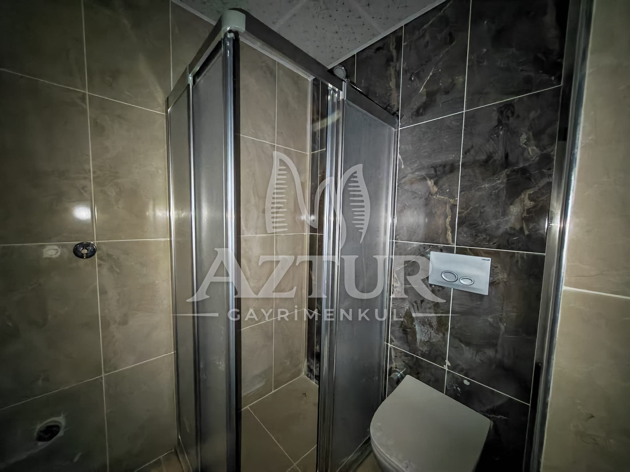 BÜYÜKŞEHİR BELEDİYESİNE YAKIN KONUMDA ARAKAT SIFIR 2+1 SATILIK DAİRE