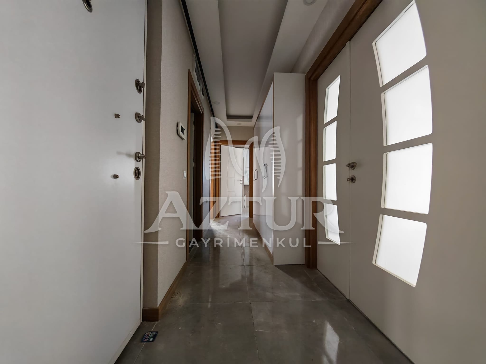 BÜYÜKŞEHİR BELEDİYESİNE YAKIN KONUMDA ARAKAT SIFIR 2+1 SATILIK DAİRE