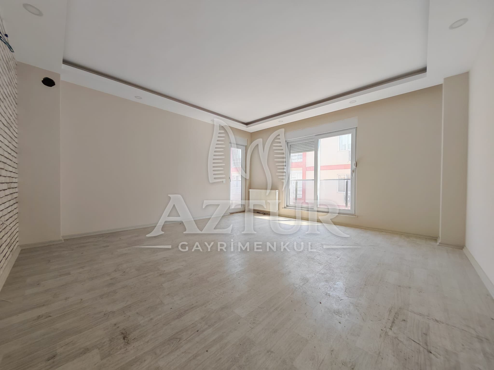 BÜYÜKŞEHİR BELEDİYESİNE YAKIN KONUMDA ARAKAT SIFIR 2+1 SATILIK DAİRE