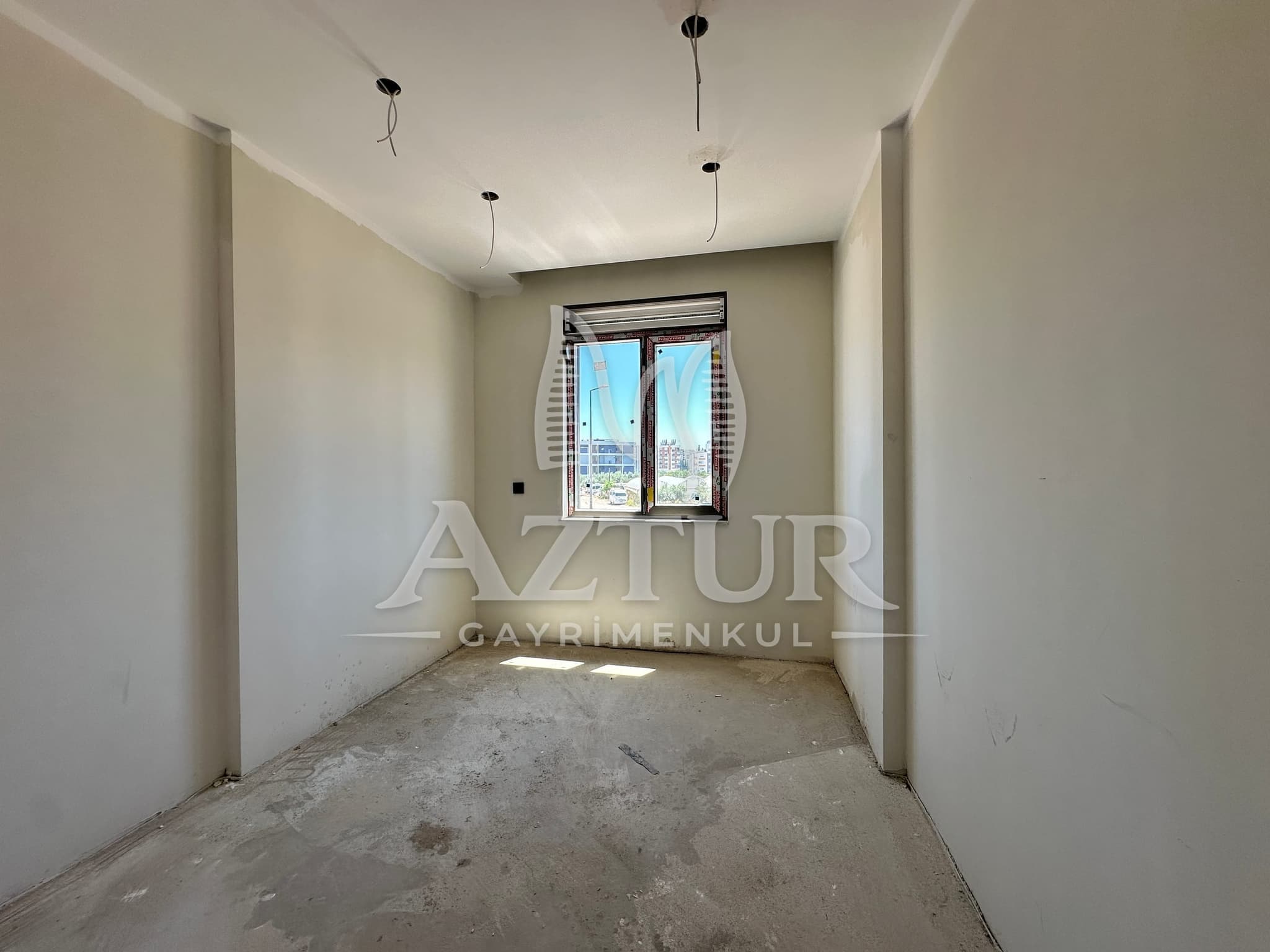 AYDOĞMUŞ'TA HAVUZLU SİTE İÇERİSİNDE SIFIR 2+1 SATILIK DAİRE