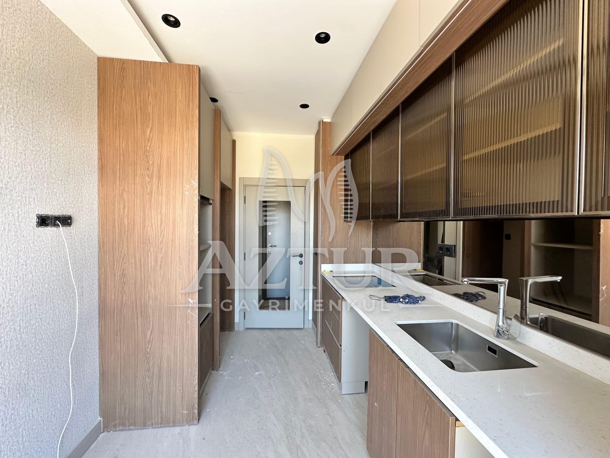 AYDOĞMUŞ'TA HAVUZLU SİTE İÇERİSİNDE SIFIR 2+1 SATILIK DAİRE