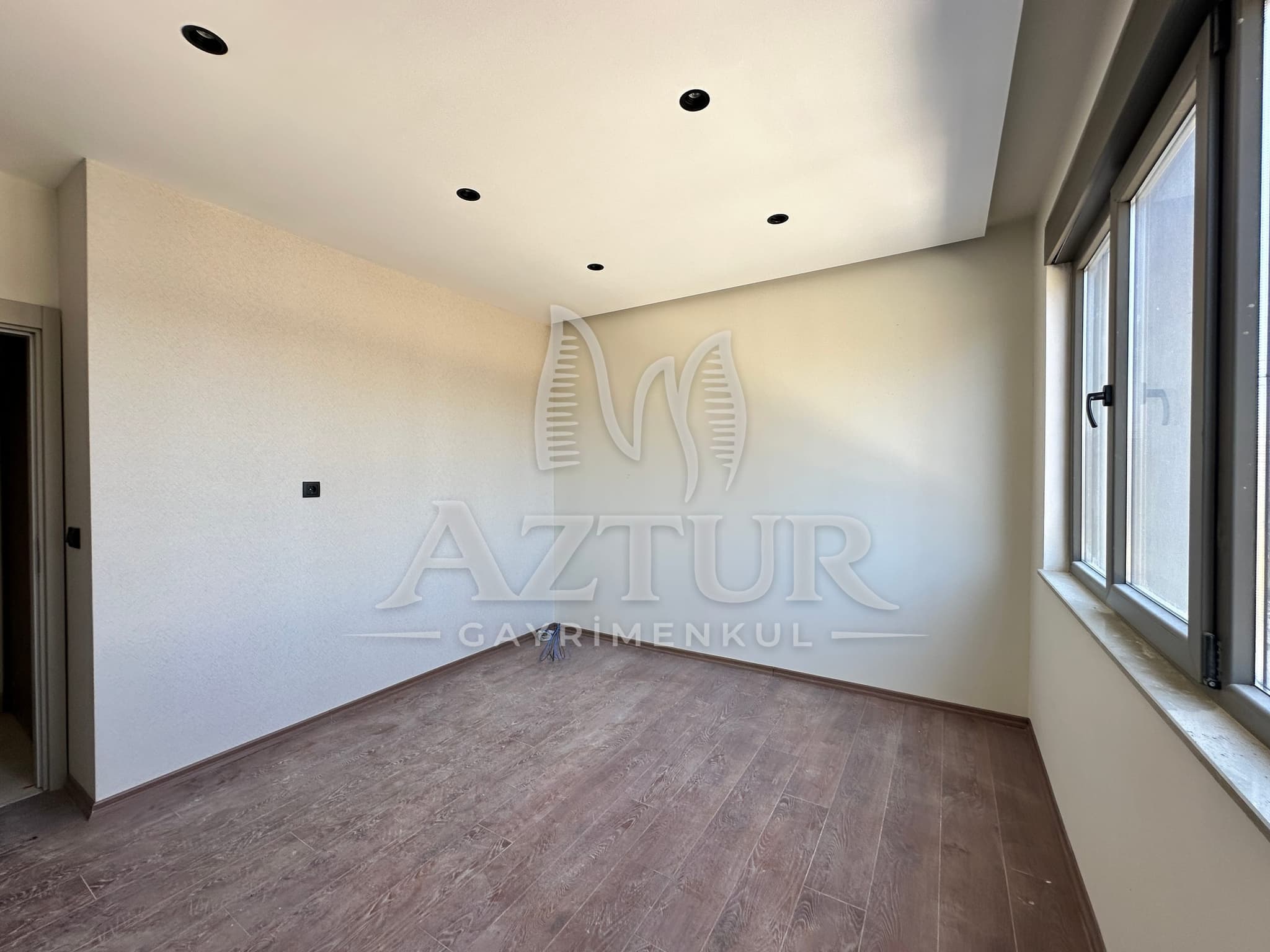 AYDOĞMUŞ'TA HAVUZLU SİTE İÇERİSİNDE SIFIR 2+1 SATILIK DAİRE