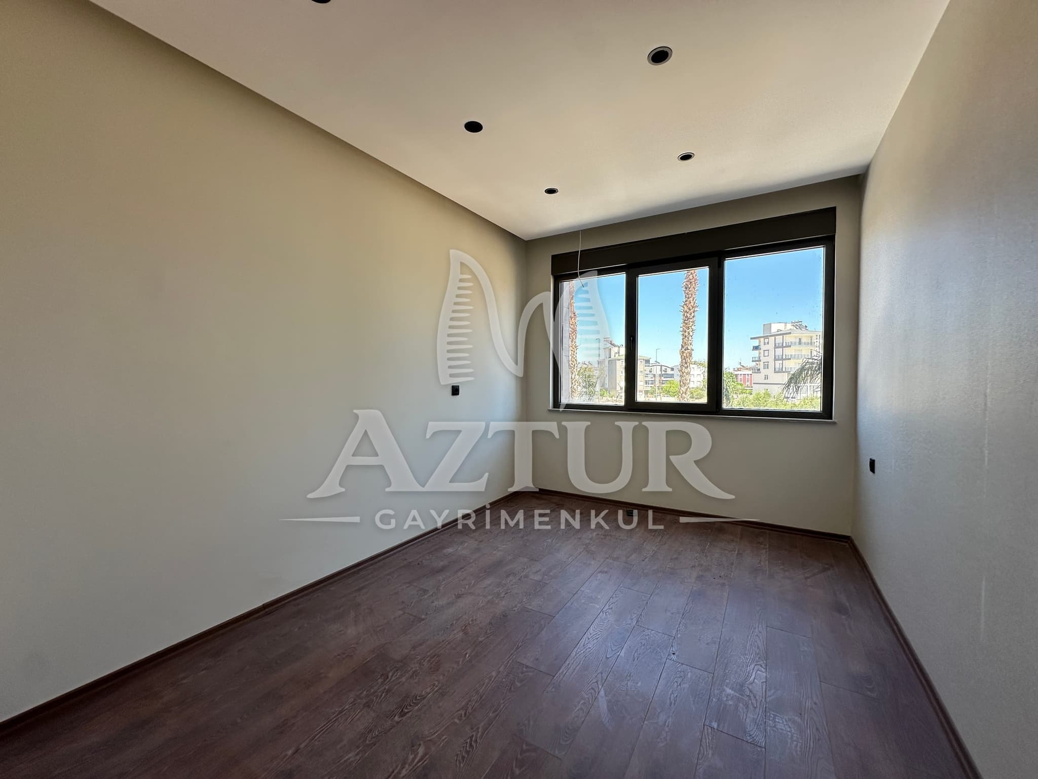 AYDOĞMUŞ'TA HAVUZLU SİTE İÇERİSİNDE SIFIR 2+1 SATILIK DAİRE